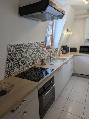 Cuisine ou kitchenette dans l'établissement Les Toits de Mittelwihr proche Colmar, Ribeauvillé