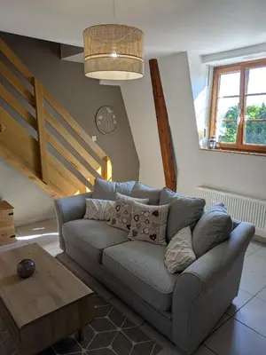 Coin salon dans l'établissement Les Toits de Mittelwihr proche Colmar, Ribeauvillé