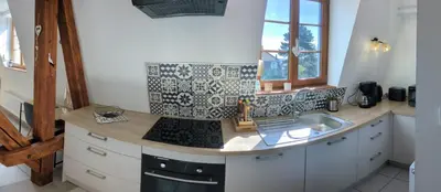 Cuisine ou kitchenette dans l'établissement Les Toits de Mittelwihr proche Colmar, Ribeauvillé