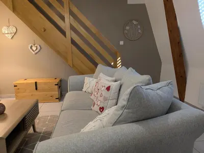 Coin salon dans l'établissement Les Toits de Mittelwihr proche Colmar, Ribeauvillé