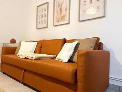 Coin salon dans l'établissement Magnifique appartement proche gare