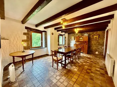 Coin salon dans l'établissement La Ferme du Pré Toussaint - Spacieux gîte au calme