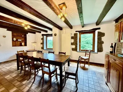 Coin salon dans l'établissement La Ferme du Pré Toussaint - Spacieux gîte au calme