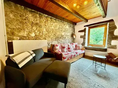 Coin salon dans l'établissement La Ferme du Pré Toussaint - Spacieux gîte au calme