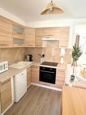 Cuisine ou kitchenette dans l'établissement Azura - Guest House