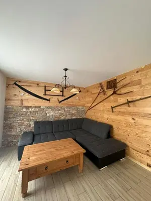 Coin salon dans l'établissement Gîtes pour 2 à 6 personnes Manala et Vivala
