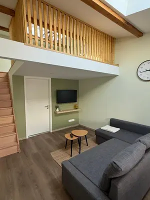 Télévision ou salle de divertissement dans l'établissement Duplex appartement en plein centre