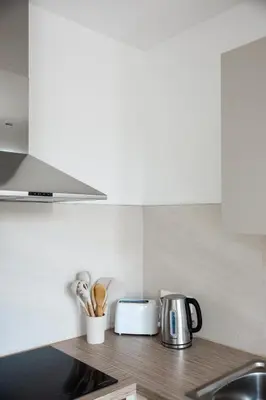 Cuisine ou kitchenette dans l'établissement Nordique