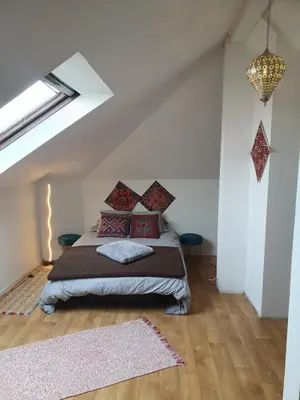 Un ou plusieurs lits dans un hébergement de l'établissement Duplex Éléonore-Lilas