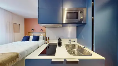 Cuisine ou kitchenette dans l'établissement Résidence CoLiving Porte de France - Self Check In by Homenhancement