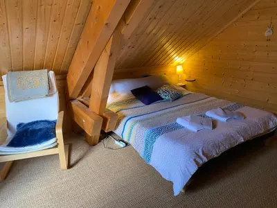 Un ou plusieurs lits dans un hébergement de l'établissement Chalet scandinave