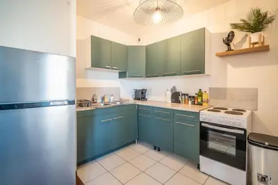 Cuisine ou kitchenette dans l'établissement Le Petit Stan - 5 min walk to the center - Quiet and cozy