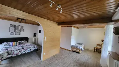 Un ou plusieurs lits dans un hébergement de l'établissement Suite Cosy Deluxe 