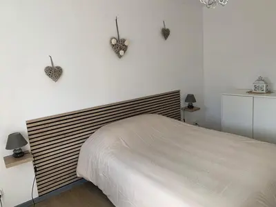 Un ou plusieurs lits dans un hébergement de l'établissement Appartement de la Chapelle