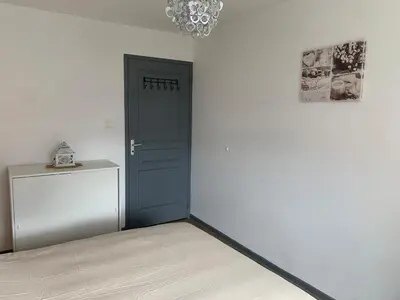 Un ou plusieurs lits dans un hébergement de l'établissement Appartement de la Chapelle