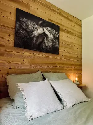 Un ou plusieurs lits dans un hébergement de l'établissement Lakeside - Appartement cosy au bord du lac