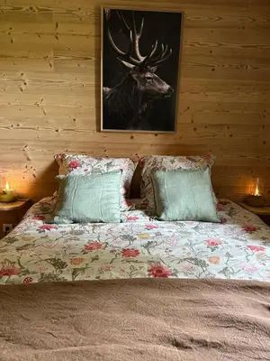 Un ou plusieurs lits dans un hébergement de l'établissement Lakeside - Appartement cosy au bord du lac