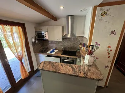 Cuisine ou kitchenette dans l'établissement Domaine de la prairie des prés