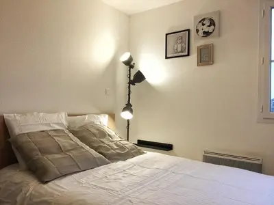 Un ou plusieurs lits dans un hébergement de l'établissement Le Cozy Fonderie