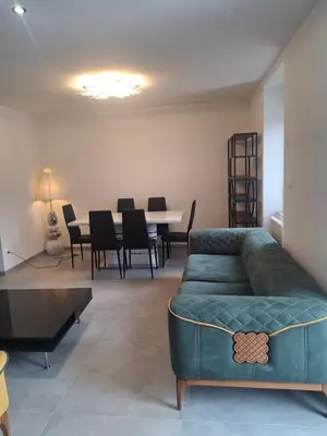 Coin salon dans l'établissement Appartement T3 neuf