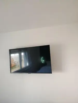 Télévision ou salle de divertissement dans l'établissement NG-Global Home
