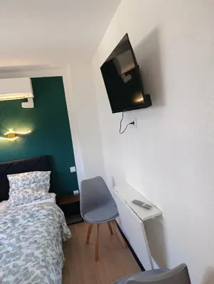 Télévision ou salle de divertissement dans l'établissement NG-Global Home