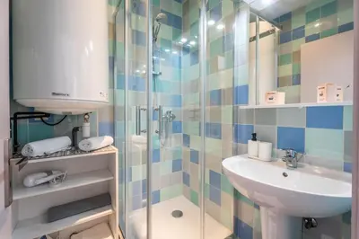 Salle de bains dans l'établissement Le Bantz 3 Appartement Mulhouse Wi-Fi