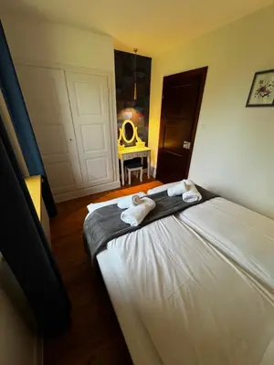 Un ou plusieurs lits dans un hébergement de l'établissement Just In Colmar, maison complète avec parking privé
