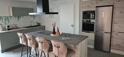 Cuisine ou kitchenette dans l'établissement CHEZ GERALDINE GITES à LA FERME