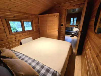 Un ou plusieurs lits dans un hébergement de l'établissement Chalet du Grand Arbre