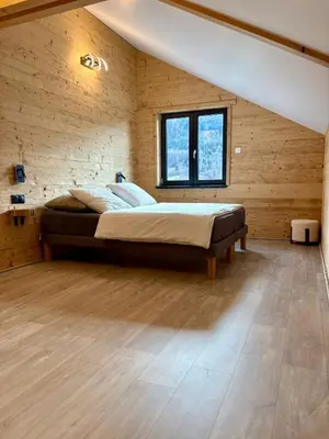 Un ou plusieurs lits dans un hébergement de l'établissement Chalet Iris, spa privatif, 4p