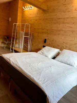 Un ou plusieurs lits dans un hébergement de l'établissement Chalet Iris, spa privatif, 4p