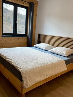 Un ou plusieurs lits dans un hébergement de l'établissement Chalet Muguet, spa privatif, 4p