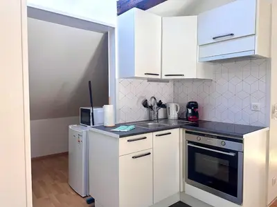Cuisine ou kitchenette dans l'établissement #tir des reves