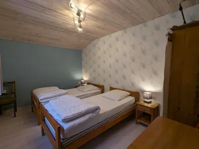 Un ou plusieurs lits dans un hébergement de l'établissement Chalet confortable dans les Vosges - 2 gîtes indépendants - FR-1-589-838