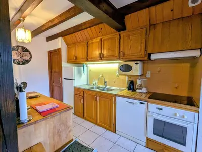 Cuisine ou kitchenette dans l'établissement Chalet familial dans le Parc des Vosges, wifi et animaux acceptés - FR-1-589-840