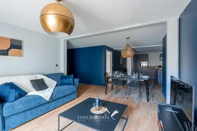 Coin salon dans l'établissement Outre-mer - apartment in center of Colmar