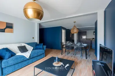 Coin salon dans l'établissement Outre-mer - apartment in center of Colmar