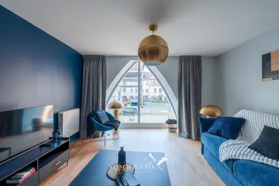 Coin salon dans l'établissement Outre-mer - apartment in center of Colmar