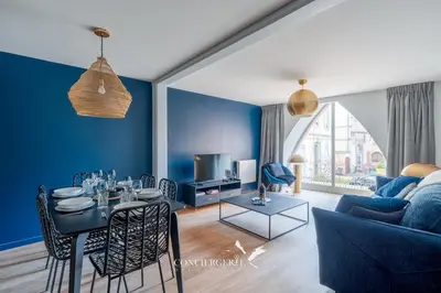 Coin salon dans l'établissement Outre-mer - apartment in center of Colmar