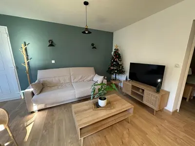 Télévision ou salle de divertissement dans l'établissement Appartement 4 personnes