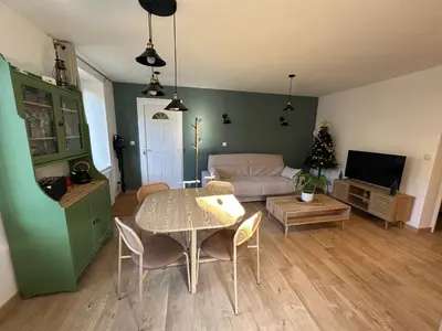 Télévision ou salle de divertissement dans l'établissement Appartement 4 personnes