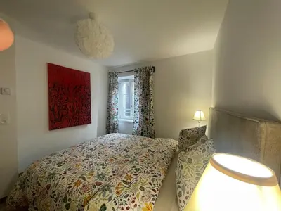 Un ou plusieurs lits dans un hébergement de l'établissement Maison Bleue, Appartements Thann centre, proche vignoble, terrasse avec vue