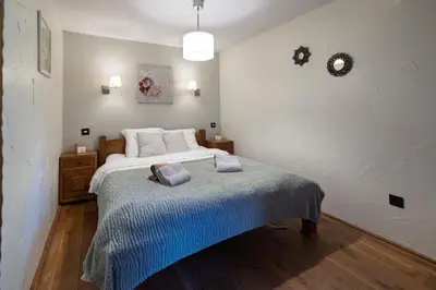Un ou plusieurs lits dans un hébergement de l'établissement Chalet Les Lucioles, La Bresse 14p - SPA