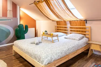 Un ou plusieurs lits dans un hébergement de l'établissement Casa del Sol - Jacuzzi & Boho Elegance