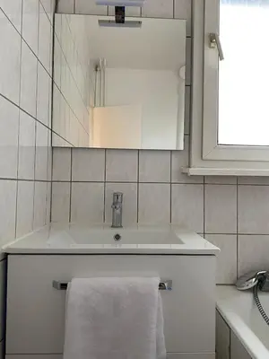 Salle de bains dans l'établissement Maison Tivoli