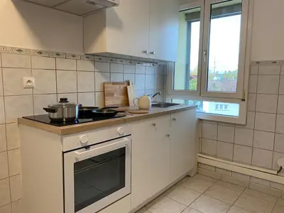 Cuisine ou kitchenette dans l'établissement Maison Tivoli