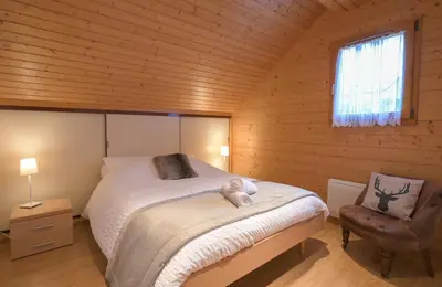 Un ou plusieurs lits dans un hébergement de l'établissement Chalet Mulli, Familial 7p, Jardins & Terrasse à Gérardmer
