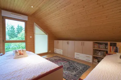 Un ou plusieurs lits dans un hébergement de l'établissement Chalet Mulli, Familial 7p, Jardins & Terrasse à Gérardmer
