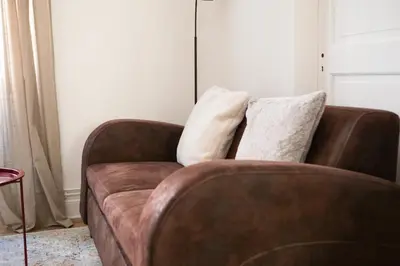 Coin salon dans l'établissement Nouveau - Munst Air Lodge à 20 min de Colmar